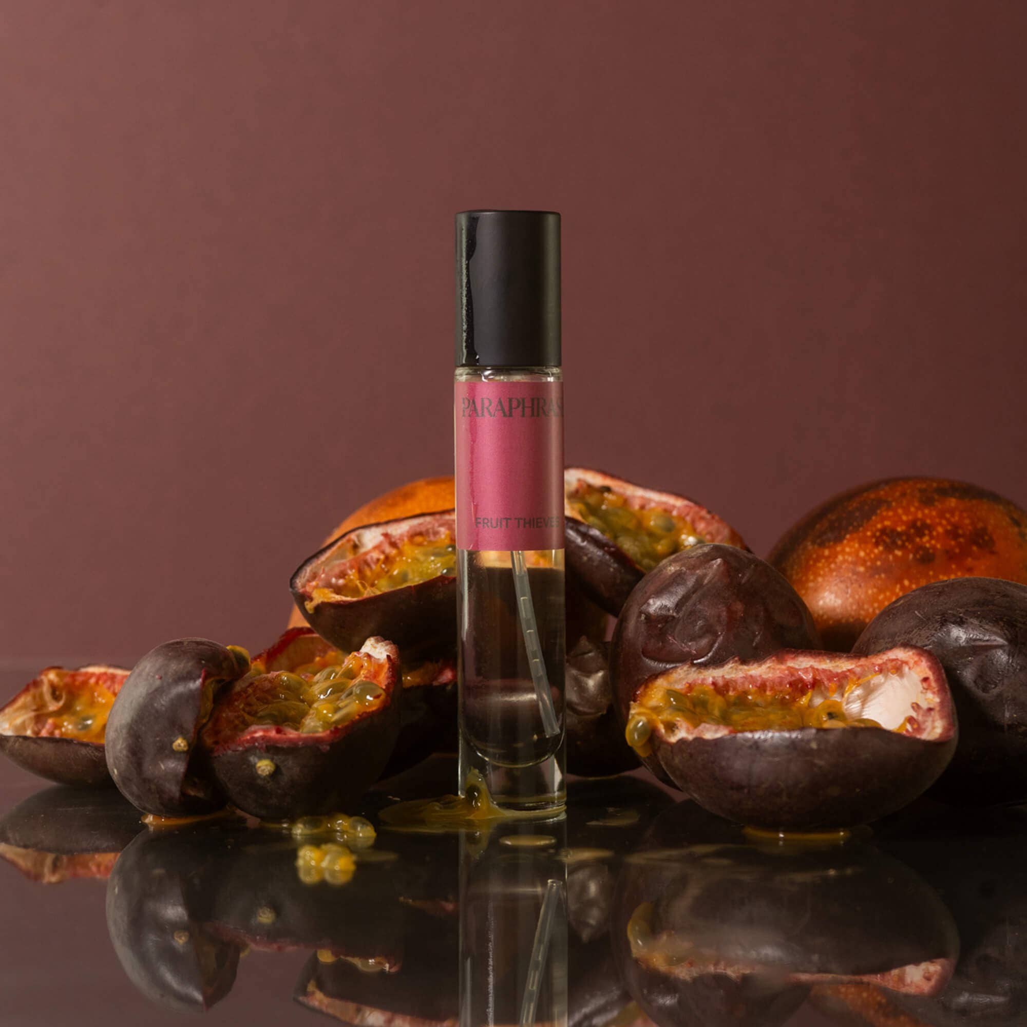 Passionfruit and green vine scented Eau de Parfum rollerball with fresh fruit