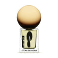 Stora Skuggan Moonmilk Eau de Parfum in rectangular glass bottle with black label and gradient cream-to-brown spherical cap