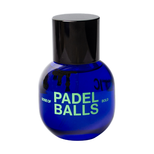 Pills - Padel Balls. A cobalt blue glass bottle of Code of Padel Balls Gold with a black cap, centered on a plain white background.