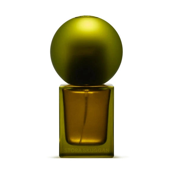 Stora Skuggan Pine Eau de Parfum in amber-green glass with olive cap